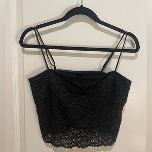 Urban Outfitters’ Out from Under Black Overlay Lace Cropped Tank Top